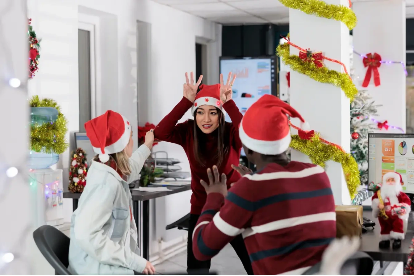 Home 6 office employees taking part in Festive team activities
